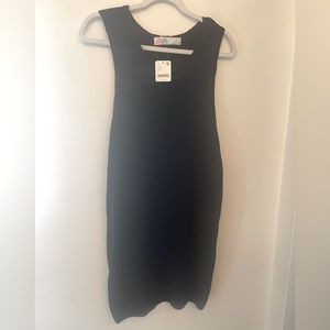 Free People beach sweater dress. Size small. Black. NWT